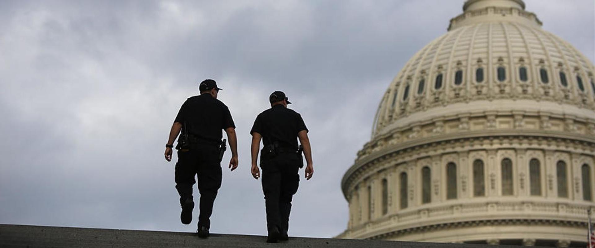 USCP walking up steps of U.S. Capitol