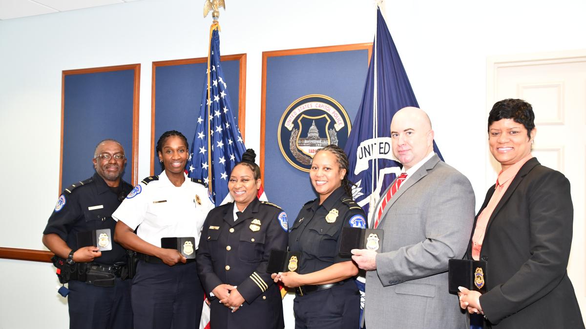 Captain Eric Graves, Inspector Denea Newell, Acting Chief Yogananda Pittman, Captain Tia Summers, Deputy Chief Jason Bell, Inspector Jeanita Mitchell. Everyone in this photo has been vaccinated. 