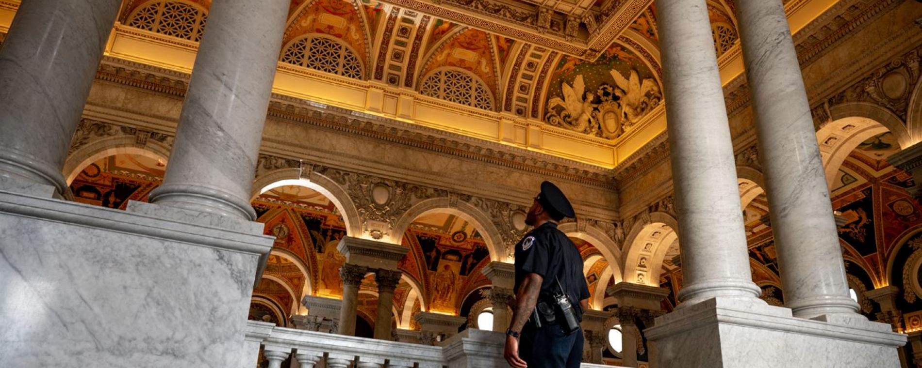 USCP Officer look at the ceiling in the Library of Congress