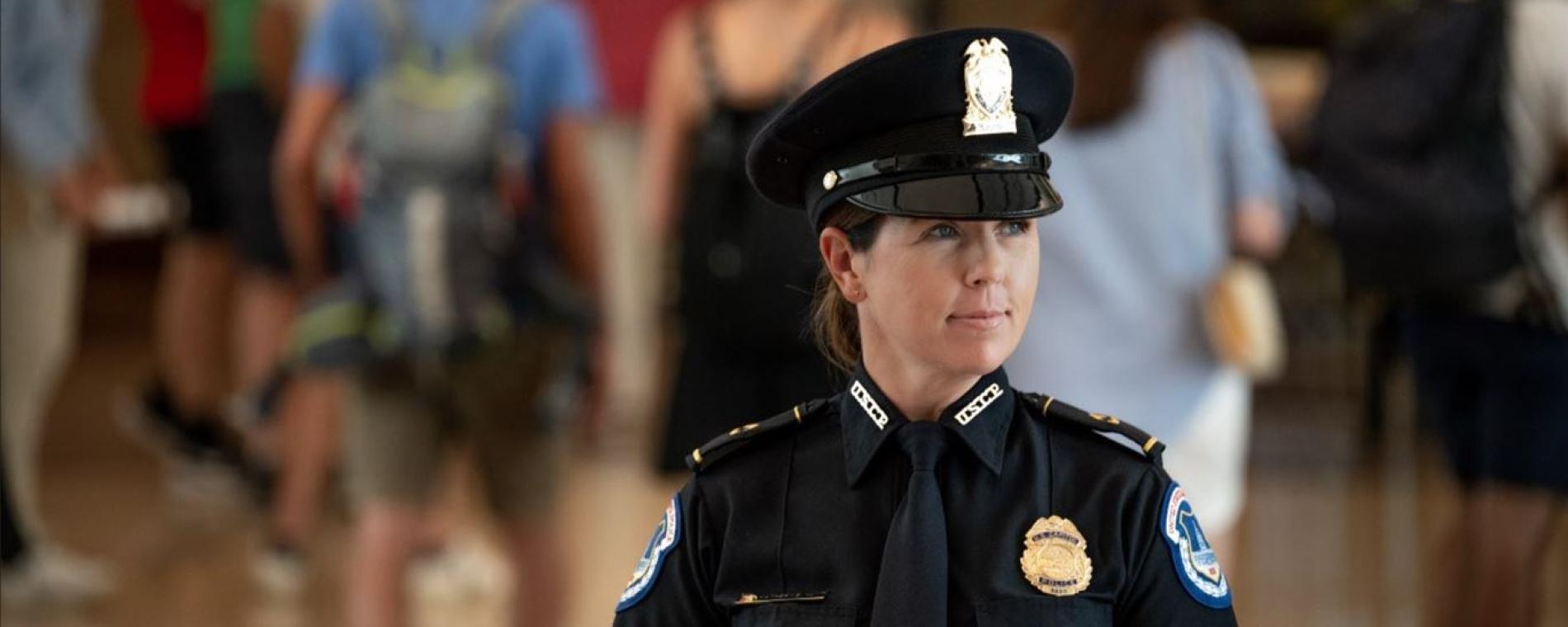 USCP Officer and tourists in the Capitol Visitor Center