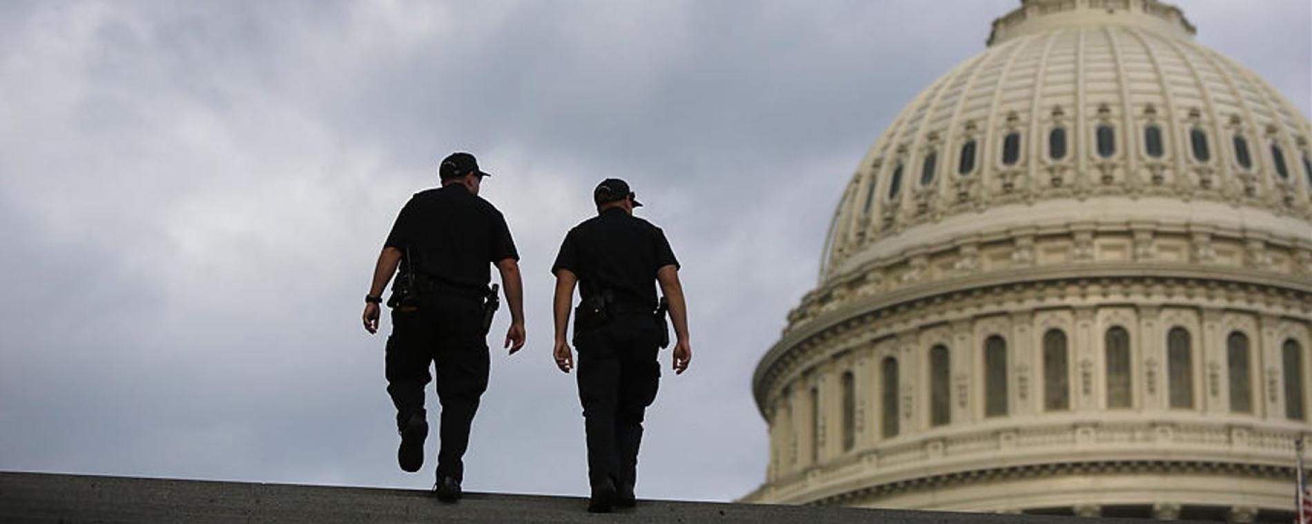 USCP walking up steps of U.S. Capitol