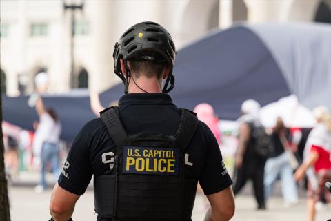 Photo of backside of USCP officer in black uniform